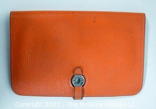 Authentic Hermes Togo Dogon Duo Wallet in Orange Abricot.  