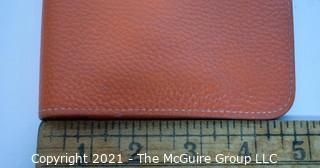 Authentic Hermes Togo Dogon Duo Wallet in Orange Abricot.  