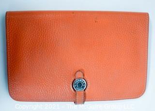 Authentic Hermes Togo Dogon Duo Wallet in Orange Abricot.  