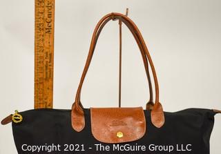 Longchamp Le Pliage Foldable Large Tote Bag with Leather Handles and Flap. 