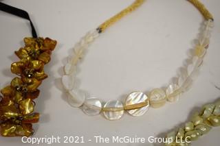 Four Shell and Mother of Pearl Beaded Necklaces.