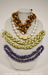 Four Shell and Mother of Pearl Beaded Necklaces.