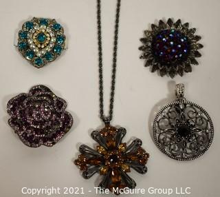 Five Rhinestone Brooches or Pendants. 