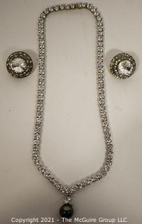 Clear Rhinestone with Faux Pearl Necklace and Coordinating Rhinestone Clip On Earrings.