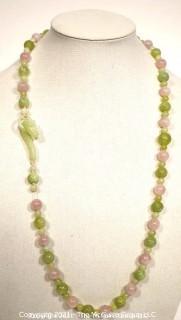 Pink Quartz & Green Stone or Jade Beads with Carved Seahorse Catch Necklace.   Measures approximately 32" long. 