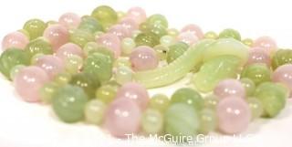 Pink Quartz & Green Stone or Jade Beads with Carved Seahorse Catch Necklace.   Measures approximately 32" long. 