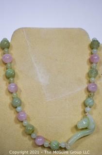 Pink Quartz & Green Stone or Jade Beads with Carved Seahorse Catch Necklace.   Measures approximately 32" long. 