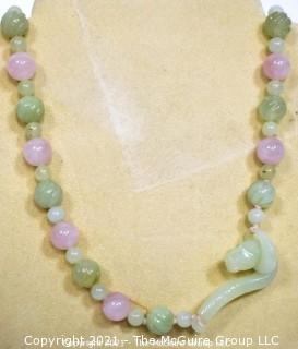 Pink Quartz & Green Stone or Jade Beads with Carved Seahorse Catch Necklace.   Measures approximately 32" long. 