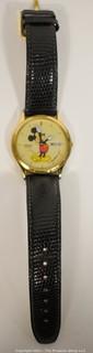 Gold Walt Disney Mickey Mouse Wrist Watch made by Seiko with Black Band.  Untested.