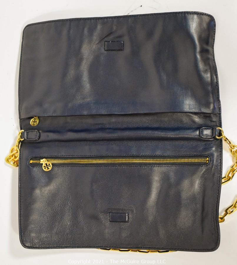 The McGuire Group LLC - Auction: 113:Session 1: Ladies Fine Jewelry, Luxe  Accessories and Designer Fashions ITEM: Tory Burch Floral Print Patent  Leather Folding Clutch with Chain Strap & Navy Blue Interior.