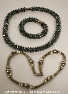 Three Pieces of Sparkly Jewelry.