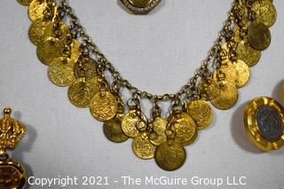 Four (4) Pieces of Gold Toned Coin Themed Costume Jewelry.  Two necklaces and two pairs of Clip on Earrings.