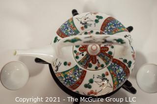 Porcelain Asian Stamped Hand Painted Tea Pot and 5 Tea Cups.