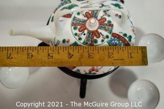 Porcelain Asian Stamped Hand Painted Tea Pot and 5 Tea Cups.