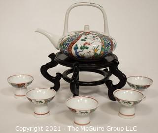 Porcelain Asian Stamped Hand Painted Tea Pot and 5 Tea Cups.