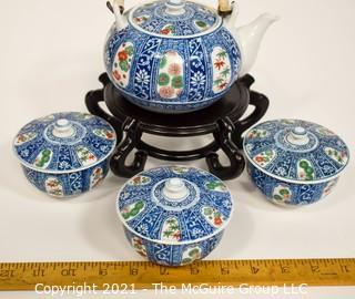 Porcelain Asian Stamped Hand Painted Tea Pot and 3 Tea Cups with Lids. 