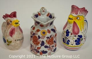 Three water pitchers: Italian rooster (hand painted Deruta; oriental motif; and Italian rooster (Nordstrom)