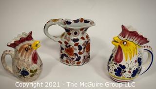 Three water pitchers: Italian rooster (hand painted Deruta; oriental motif; and Italian rooster (Nordstrom)