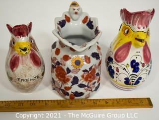 Three water pitchers: Italian rooster (hand painted Deruta; oriental motif; and Italian rooster (Nordstrom)