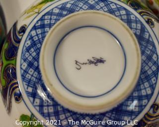 Porcelain Asian Stamped Hand Painted Tea Pot and 4 Tea Cups.