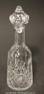 Waterford Crystal decanter with stopper; 12" tall.  (Note: damage to base of stopper)