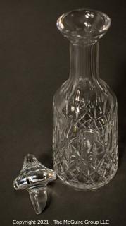 Waterford Crystal decanter with stopper; 12" tall.  (Note: damage to base of stopper)