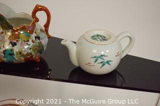 Collection of Asian Porcelain and Small Hand Painted Tea Pots. 