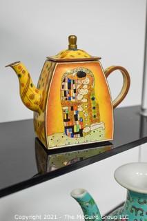 Collection of Asian Porcelain and Small Hand Painted Tea Pots. 