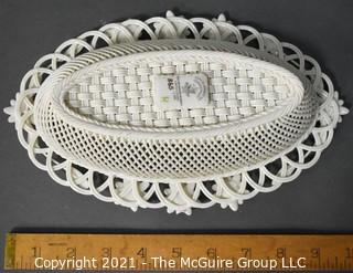 Belleek Lily Blossoms Basket, Annual Basket 2007, Numbered. Measures approximately 10" long.