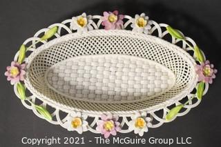 Belleek Lily Blossoms Basket, Annual Basket 2007, Numbered. Measures approximately 10" long.