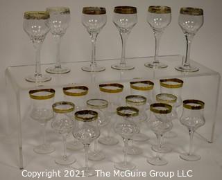 Assorted Crystal Stemware with Gold Rim: <br> <br>
(5) 7 1/2"T stems <br>
(6) 7 1/2"T stems <br>
(8) 6 7/8"T stems