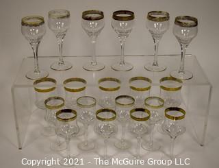 Assorted Crystal Stemware with Gold Rim: <br> <br>
(5) 7 1/2"T stems <br>
(6) 7 1/2"T stems <br>
(8) 6 7/8"T stems