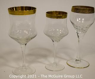 Assorted Crystal Stemware with Gold Rim: <br> <br>
(5) 7 1/2"T stems <br>
(6) 7 1/2"T stems <br>
(8) 6 7/8"T stems