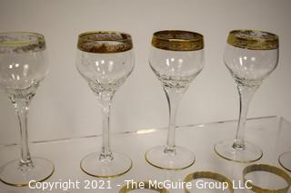 Assorted Crystal Stemware with Gold Rim: <br> <br>
(5) 7 1/2"T stems <br>
(6) 7 1/2"T stems <br>
(8) 6 7/8"T stems