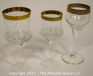 Assorted Crystal Stemware with Gold Rim: <br> <br>
(5) 7 1/2"T stems <br>
(6) 7 1/2"T stems <br>
(8) 6 7/8"T stems