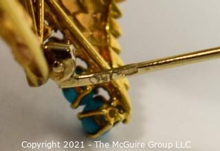 Vintage 18kt Gold Textured Brooch or Pin with Blue Gemstones.   Measures approximately 2" long and 17.6g in weight. 