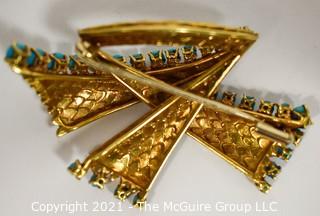 Vintage 18kt Gold Textured Brooch or Pin with Blue Gemstones.   Measures approximately 2" long and 17.6g in weight. 