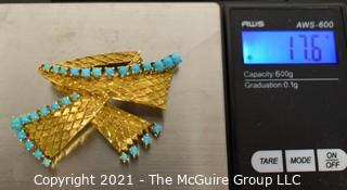 Vintage 18kt Gold Textured Brooch or Pin with Blue Gemstones.   Measures approximately 2" long and 17.6g in weight. 