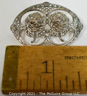 Sterling Silver Filigree with Marcasite Brooch.   Measures approximately 1 1/2' long.