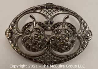 Sterling Silver Filigree with Marcasite Brooch.   Measures approximately 1 1/2' long.