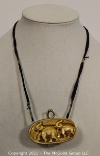 Asian Carved Bone Box Pendant or Necklace on Cord. 