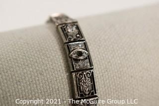 Antique Diamond Platinum over 14K Gold Art Deco Bracelet with Safety Catch.  Center Stone Missing.  Weighs approximately 15.8g