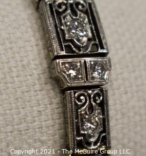 Antique Diamond Platinum over 14K Gold Art Deco Bracelet with Safety Catch.  Center Stone Missing.  Weighs approximately 15.8g