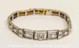 Antique Diamond Platinum over 14K Gold Art Deco Bracelet with Safety Catch.  Center Stone Missing.  Weighs approximately 15.8g