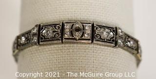 Antique Diamond Platinum over 14K Gold Art Deco Bracelet with Safety Catch.  Center Stone Missing.  Weighs approximately 15.8g