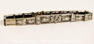 Antique Diamond Platinum over 14K Gold Art Deco Bracelet with Safety Catch.  Center Stone Missing.  Weighs approximately 15.8g