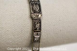 Antique Diamond Platinum over 14K Gold Art Deco Bracelet with Safety Catch.  Center Stone Missing.  Weighs approximately 15.8g