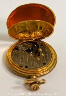 Ladies gold filled 10 year pocket watch case.  Movement, dial and face are incomplete