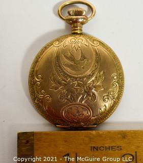 Ladies gold filled 10 year pocket watch case.  Movement, dial and face are incomplete