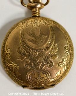 Ladies gold filled 10 year pocket watch case.  Movement, dial and face are incomplete